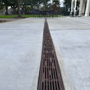 Decorative cast iron trench grate in Rain pattern