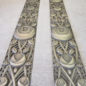 Decorative cast bronze panels with art deco rose design for sides of entry doors