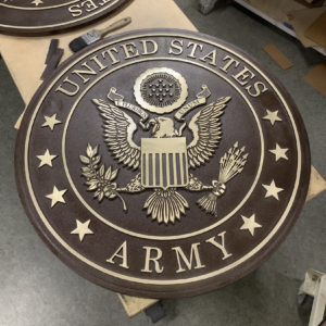 Cast Bronze plaque with "United States Army" around border and insignia in the middle
