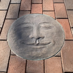 Cast bronze Moon Face embed plaque showing Full Moon face