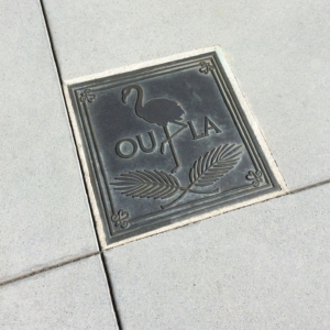 Custom cast bronze plaque that says "You Are Here" in French (Ou La)