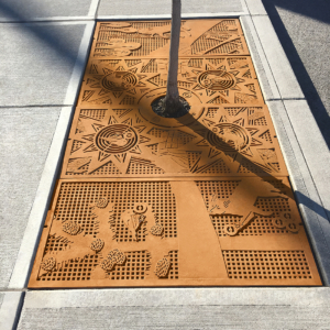 Custom cast iron tree grate designed for Spokane Arts