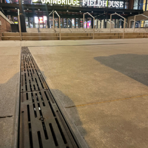 Cast iron trench drain grates with decorative Rain pattern