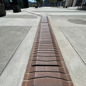 Decorative DWP / Wayfinding Tiles made from cast iron by Iron Age Designs