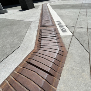 Decorative DWP / Wayfinding Tiles made from cast iron by Iron Age Designs