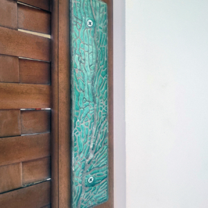 Coral patterned door push plate in cast bronze with tiffany blue patina.